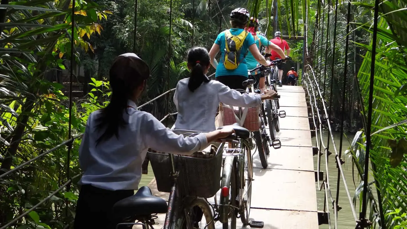 Rope bridge crossing - Vietnam cycling holiday